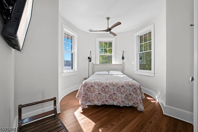 bedroom featuring ceiling fan and hardwood / wood-style floors