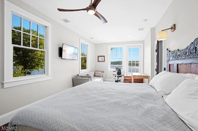 bedroom with ceiling fan and lofted ceiling