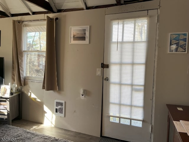 doorway featuring heating unit