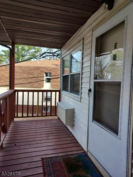 wooden deck with a porch