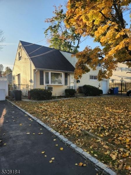 435 Warfield Rd, North Plainfield Boro, NJ 07063 - view of front of property with a garage and asphalt driveway