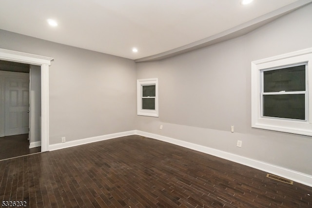 unfurnished room featuring wood-type flooring