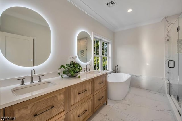 bathroom featuring vanity, crown molding, and shower with separate bathtub