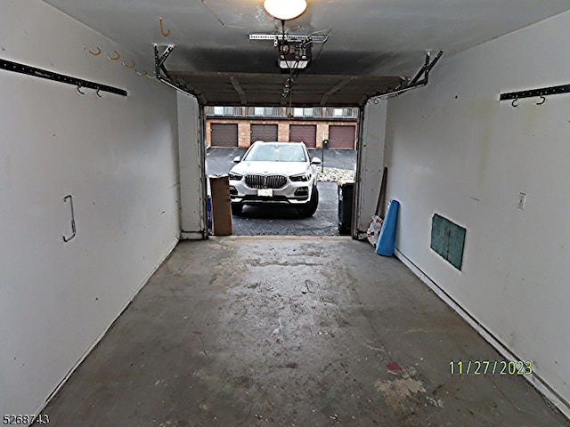 garage featuring a garage door opener