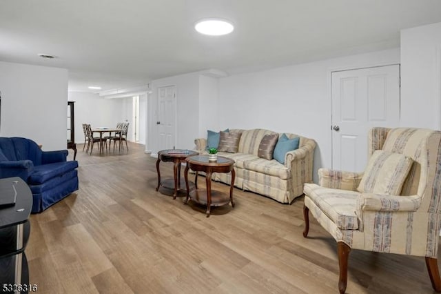 living room with light wood-type flooring