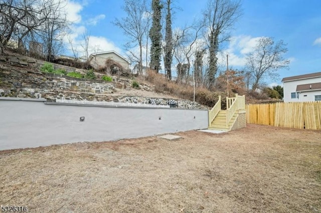 view of yard with fence