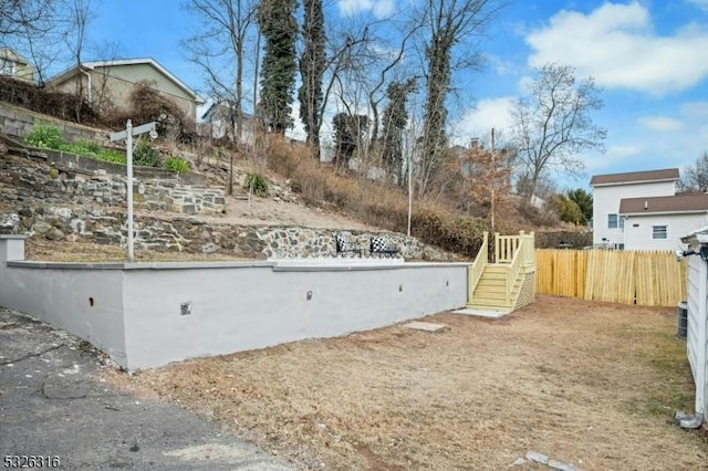 view of yard featuring fence