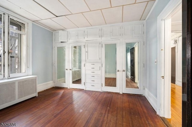 interior space featuring radiator and french doors