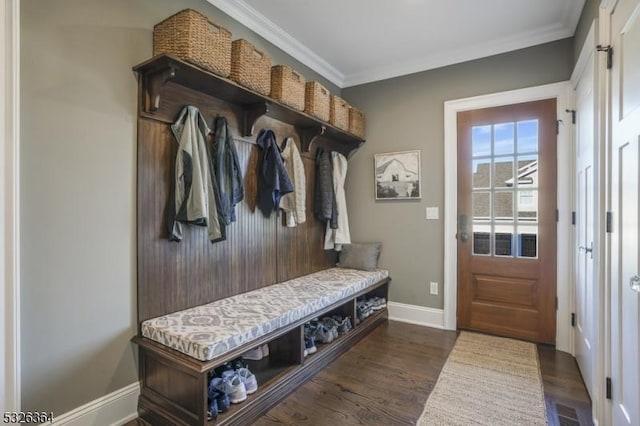 mudroom featuring dark hardwood / wood-style flooring and crown molding