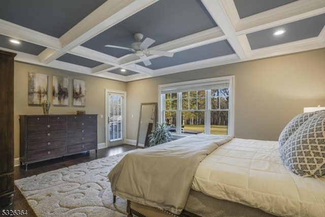 bedroom featuring dark hardwood / wood-style flooring, coffered ceiling, access to outside, ceiling fan, and crown molding