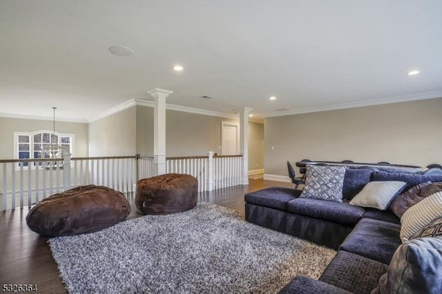 living room with dark wood-type flooring and crown molding