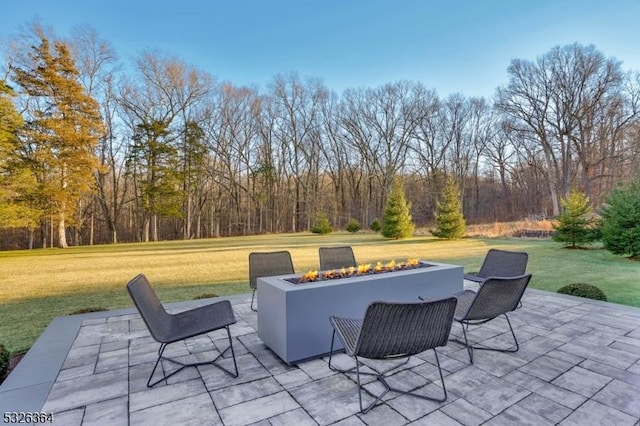 view of patio / terrace featuring a fire pit