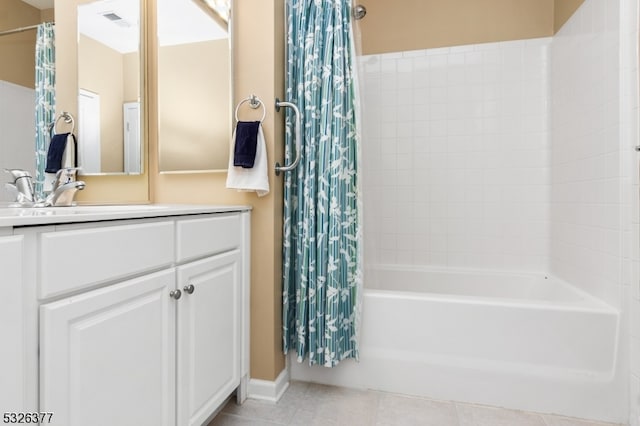 bathroom with vanity, tile patterned floors, and shower / tub combo with curtain