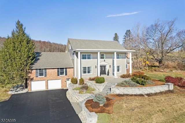 view of front of house with a garage