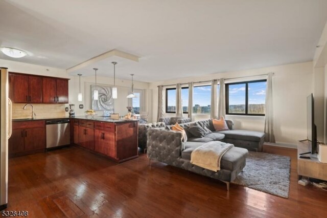 interior space with dark hardwood / wood-style flooring and sink