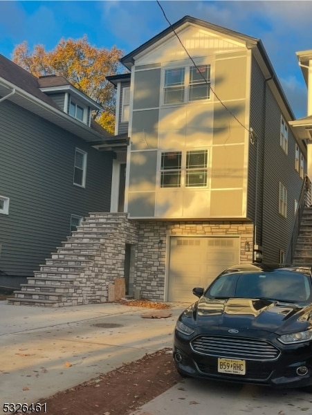 view of front of home with a garage