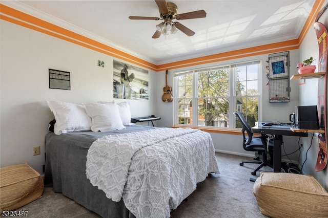 bedroom featuring ceiling fan, crown molding, and carpet flooring