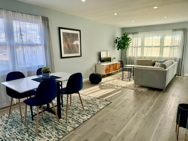 dining room featuring light wood-type flooring