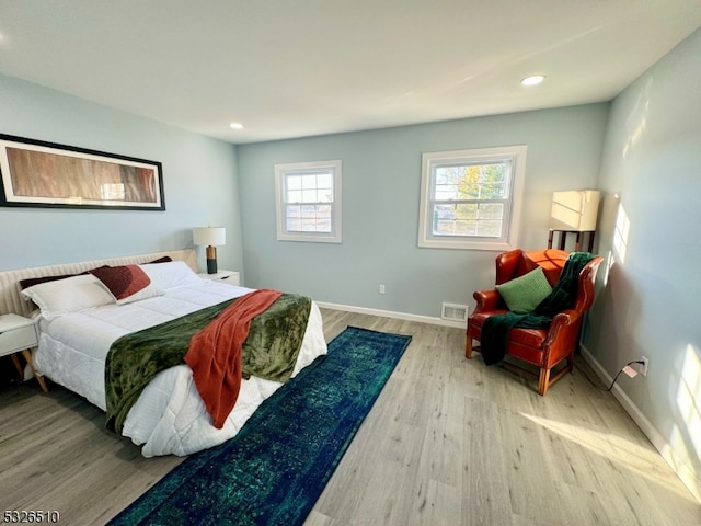 bedroom featuring light hardwood / wood-style flooring