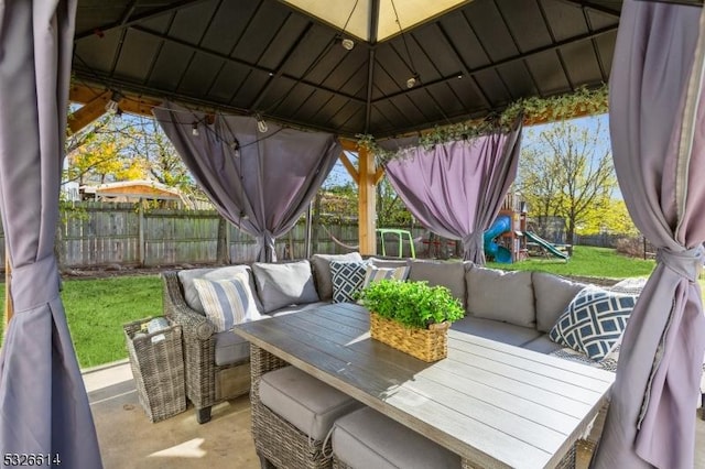 view of patio / terrace featuring a gazebo and a playground