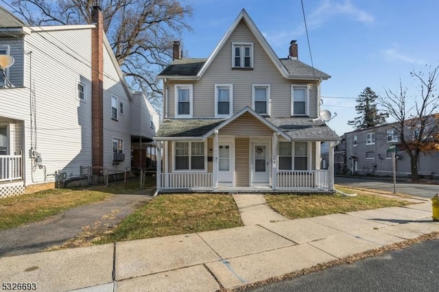 view of front facade featuring covered porch