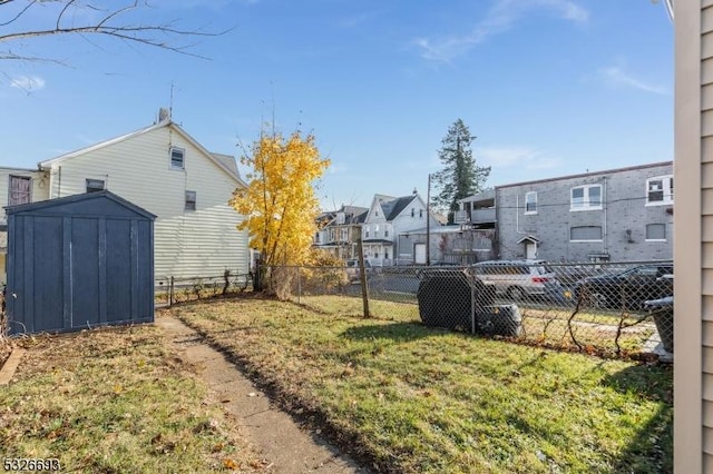 view of yard with a shed