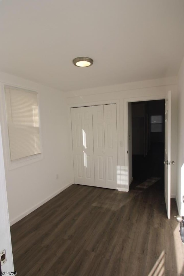 entrance foyer featuring dark hardwood / wood-style floors