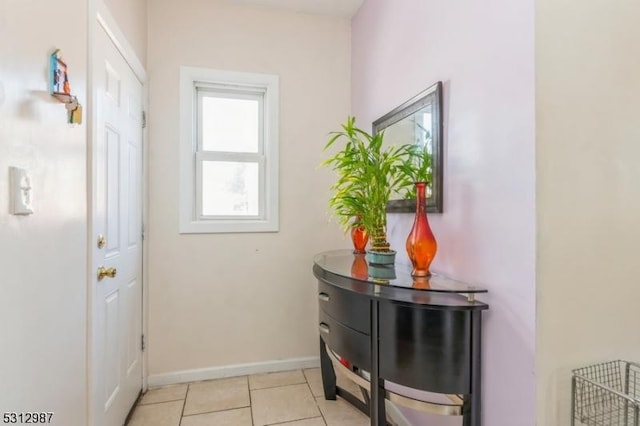 entryway featuring light tile patterned floors