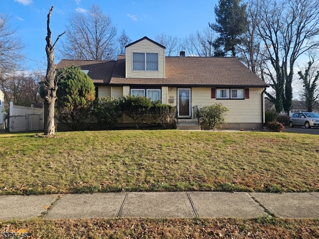 view of front of property with a front lawn