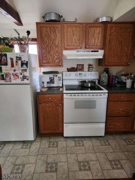 kitchen featuring white appliances