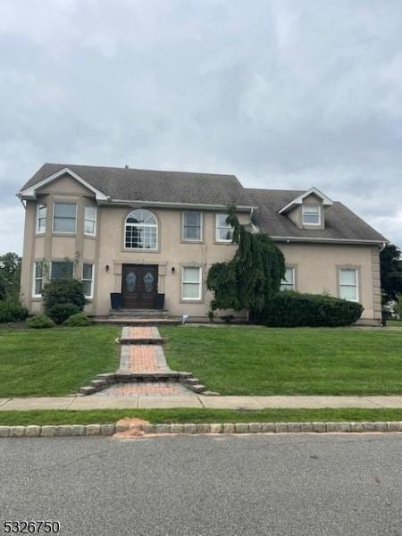 view of front of house with a front yard