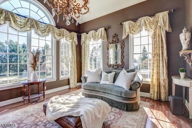 sunroom with an inviting chandelier