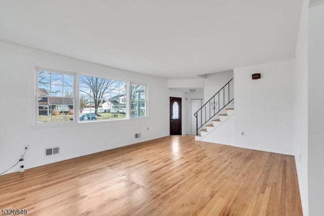 entrance foyer with hardwood / wood-style flooring