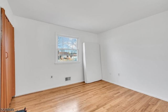 empty room featuring light hardwood / wood-style flooring