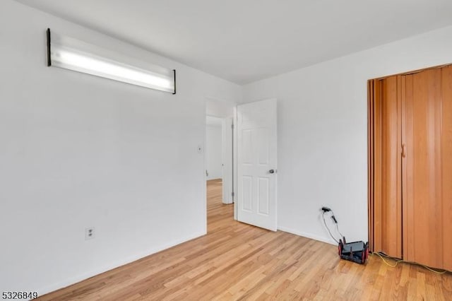 unfurnished bedroom featuring light hardwood / wood-style flooring