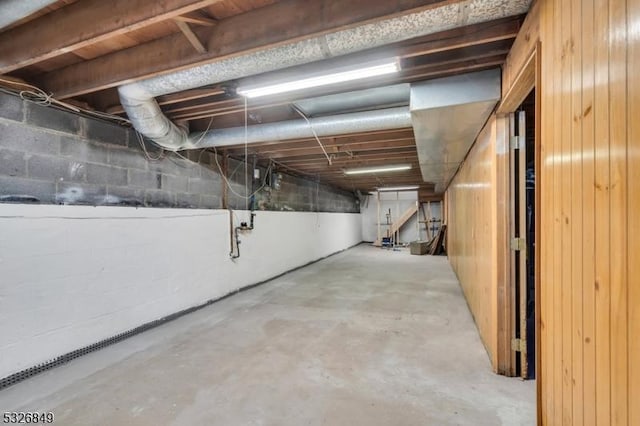 basement with wood walls