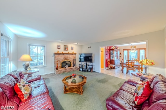 carpeted living room featuring a fireplace