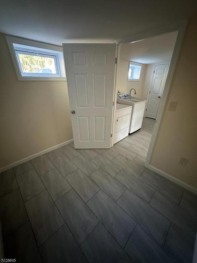 laundry room featuring washing machine and clothes dryer