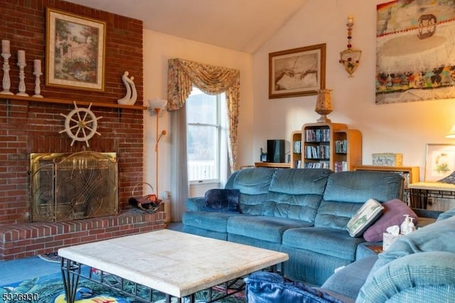 living room with lofted ceiling and a brick fireplace