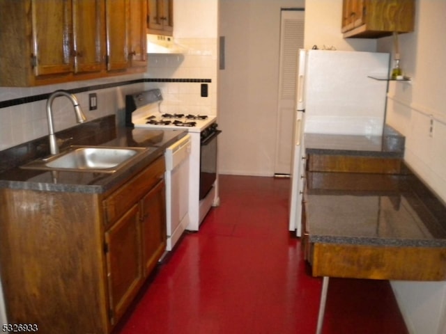 kitchen featuring decorative backsplash, sink, exhaust hood, and white appliances