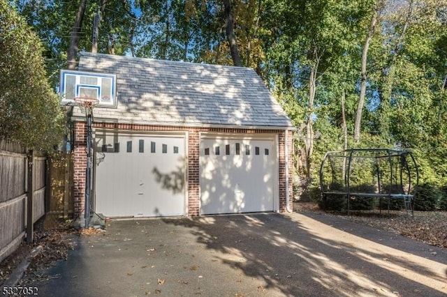 garage with a trampoline