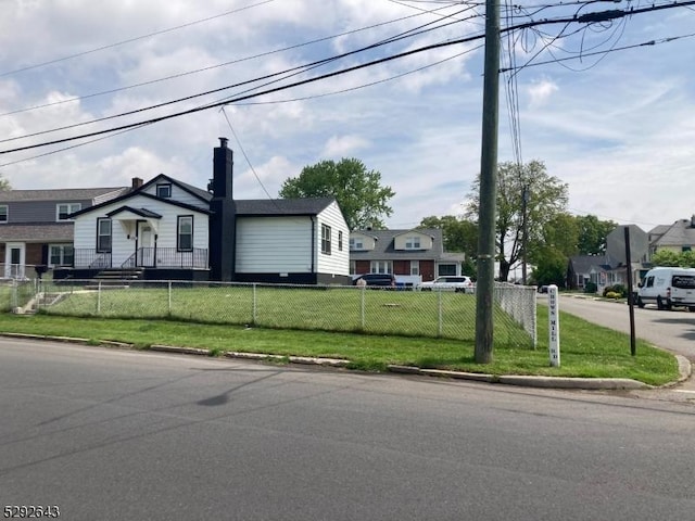 view of front of home with a front lawn