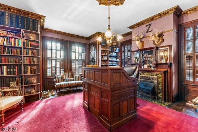 home office featuring a chandelier and dark colored carpet