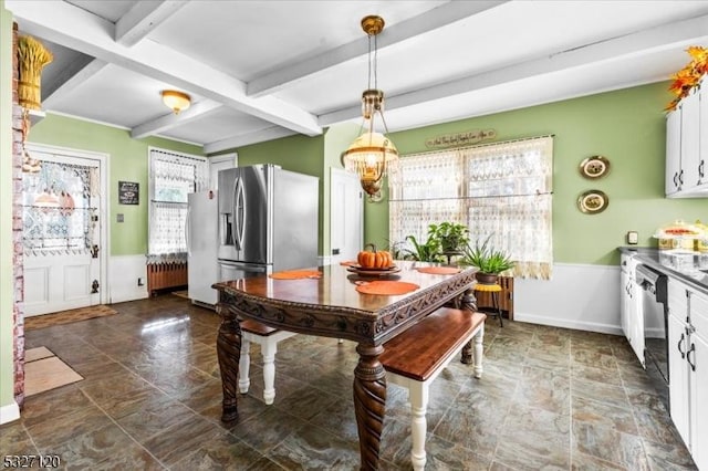 dining room featuring beamed ceiling, a chandelier, radiator, and coffered ceiling