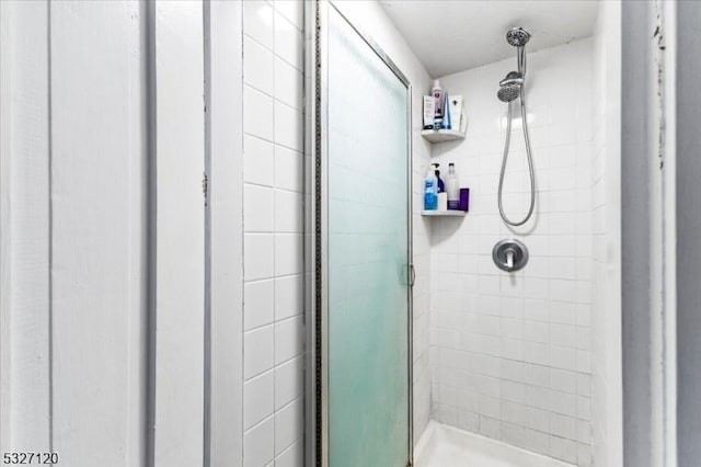 bathroom featuring an enclosed shower