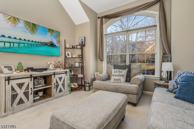 living room with light carpet and vaulted ceiling