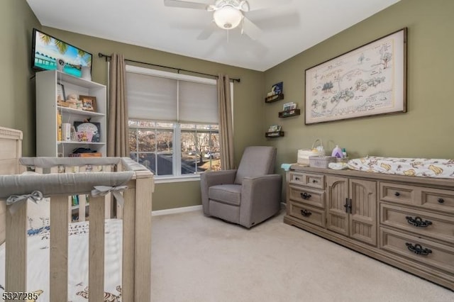 bedroom with ceiling fan and light colored carpet