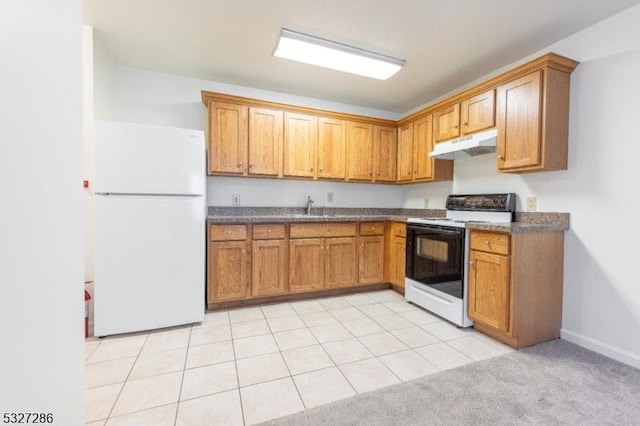 kitchen with light colored carpet, white appliances, and sink