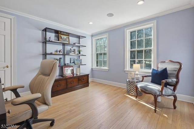 office area featuring light hardwood / wood-style floors and ornamental molding