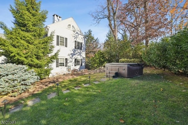 view of yard featuring a hot tub